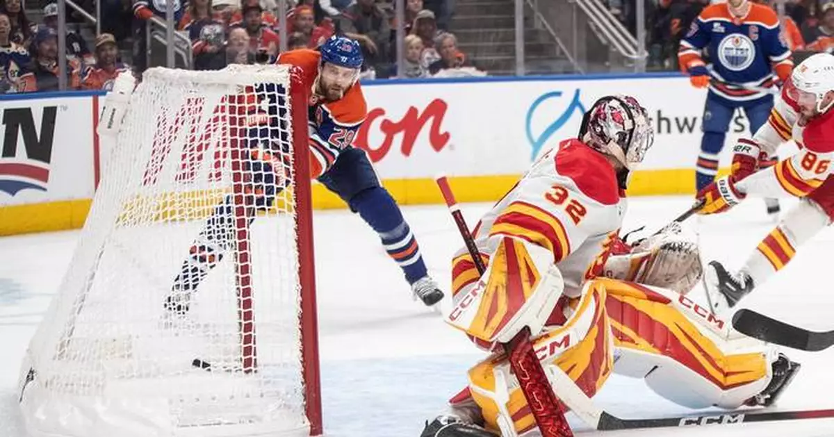 Leon Draisaitl scores his 400th NHL goal in the Oilers' opening shootout loss to the Flames