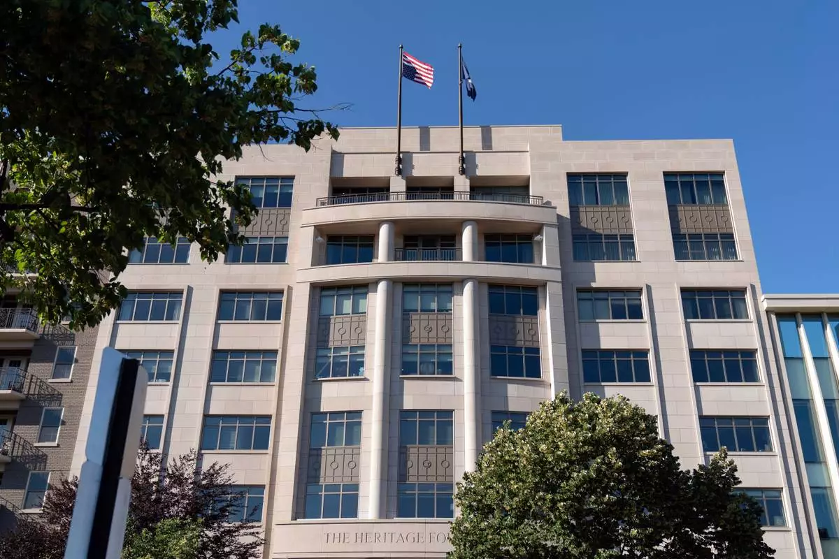 FILE -An American flag is seen upside down at the conservative Heritage Foundation in Washington, May 31, 2024. (AP Photo/Jose Luis Magana, File)