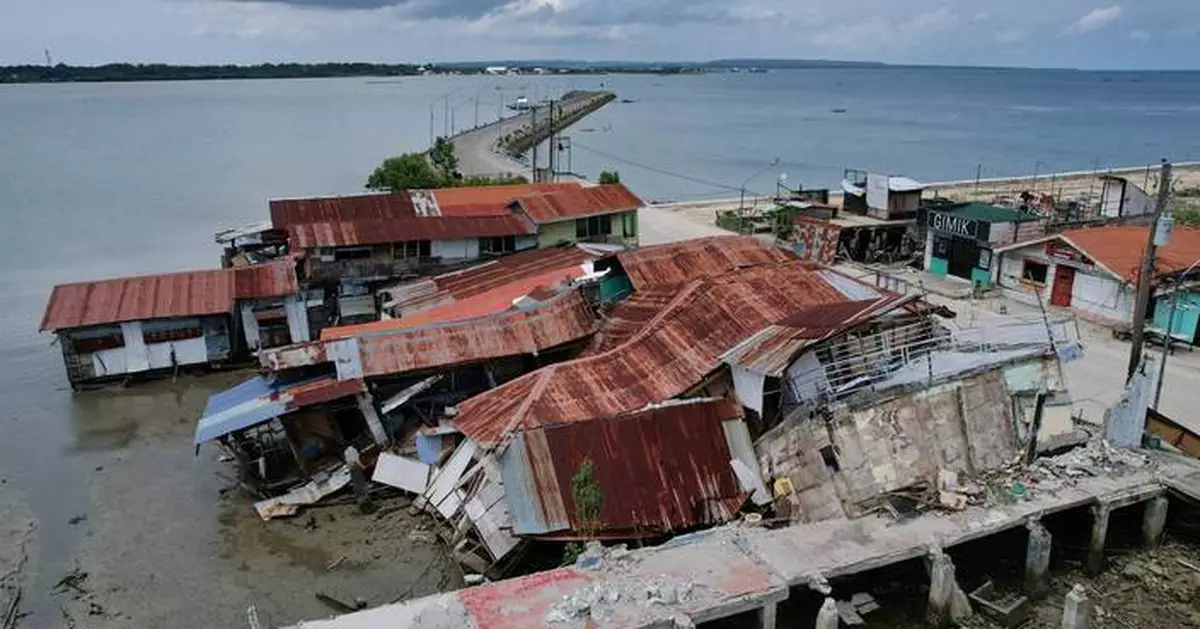 Matmo weakens into a storm after blowing across northern Philippines