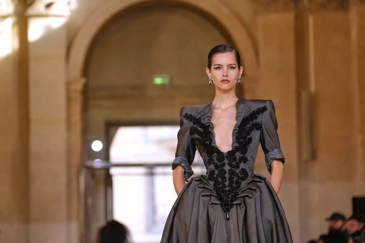 A model wears a creation as part of the Vivienne Westwood Spring/Summer 2026 collection presented in Paris, Saturday, Oct. 4, 2025. (AP Photo/Aurelien Morissard)