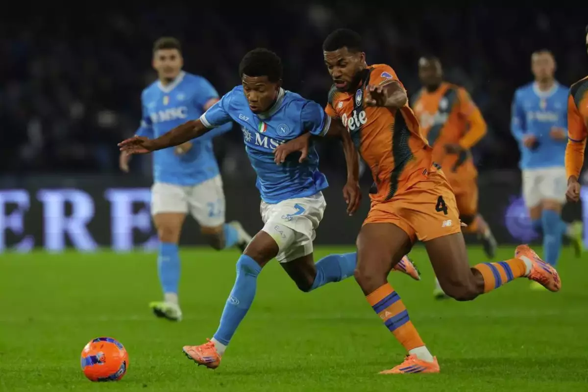 Neres scores twice to help Napoli move top of Serie A, Bologna wins to join Inter and Roma in 2nd