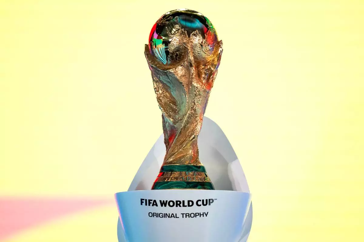 The FIFA World Cup Trophy is displayed during the FIFA World Cup 2026 playoff draw in Zurich, Switzerland, Thursday, Nov. 20, 2025. (Claudio Thoma/Keystone via AP)