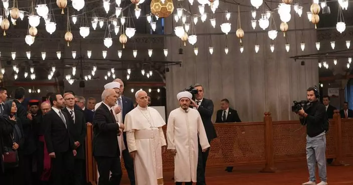 Pope visits Istanbul's Blue Mosque without praying as he focuses on unifying Christians
