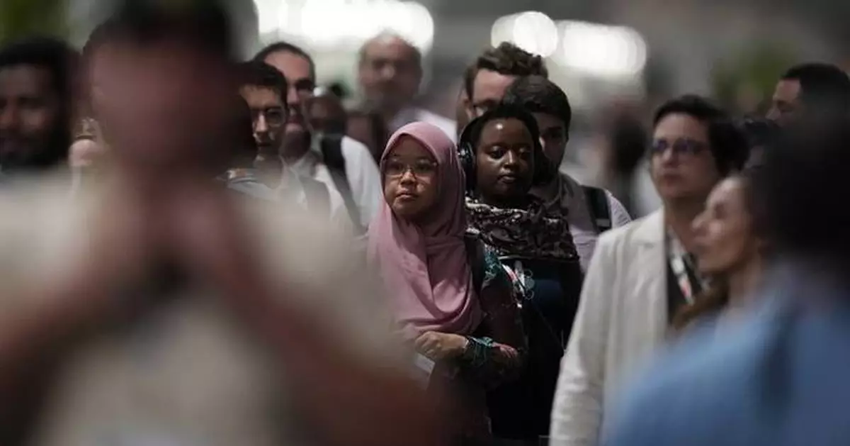 UN climate deal increases money to countries hit by climate change, but no explicit fossil fuel plan