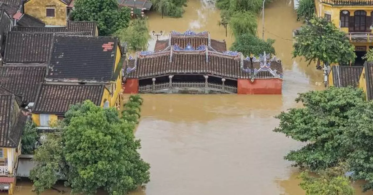 Vietnam flood death toll rises to 37 as a new typhoon threatens to worsen devastation