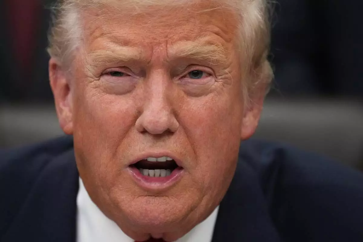 President Donald Trump speaks before signing the funding bill to reopen the government, in the Oval Office of the White House, Wednesday, Nov. 12, 2025, in Washington. (AP Photo/Jacquelyn Martin)
