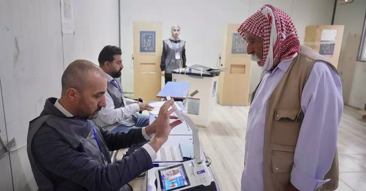 Iraq's displaced Yazidis and security forces cast ballots in early voting in parliament election