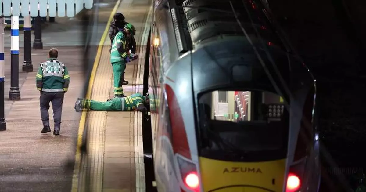 UK police release 1 of 2 men arrested over train stabbings and laud 'heroic' rail worker