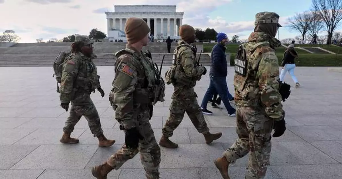 US halts all asylum decisions after shooting of National Guard members