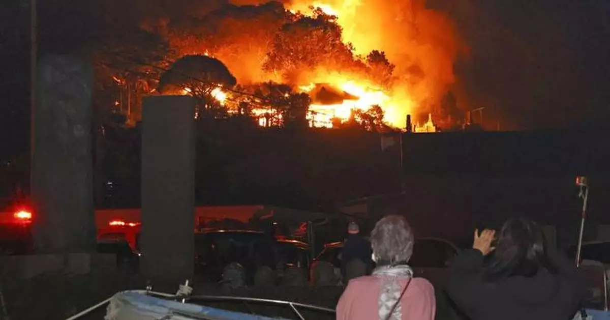 Fire burning in southwestern Japan damages 170 homes and forces evacuations