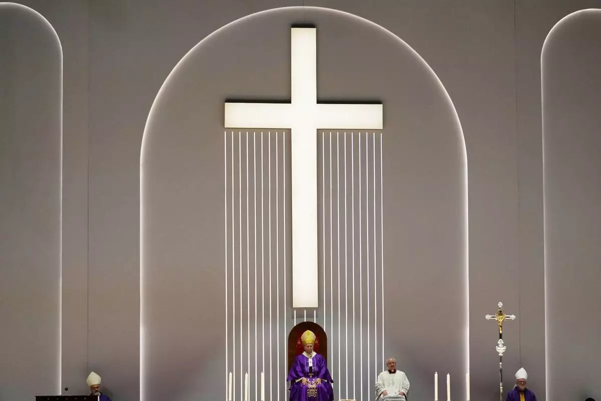 Pope Leo XIV celebrates a Mass at the Volkswagen Arena, in Istanbul, Turkey, Saturday, Nov. 29, 2025. (AP Photo/Khalil Hamra)