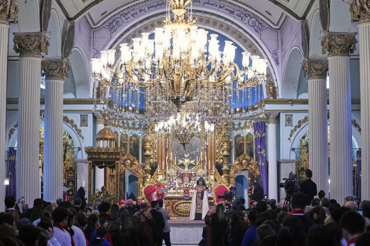 Pope Leo XIV and the Armenian Patriarch of Constantinople Archbishop Sahag II Mashalian celebrate a liturgy in the Armenian Apostolic Cathedral of Istanbul, Turkey, Sunday, Nov. 30, 2025. (AP Photo/Domenico Stinellis)