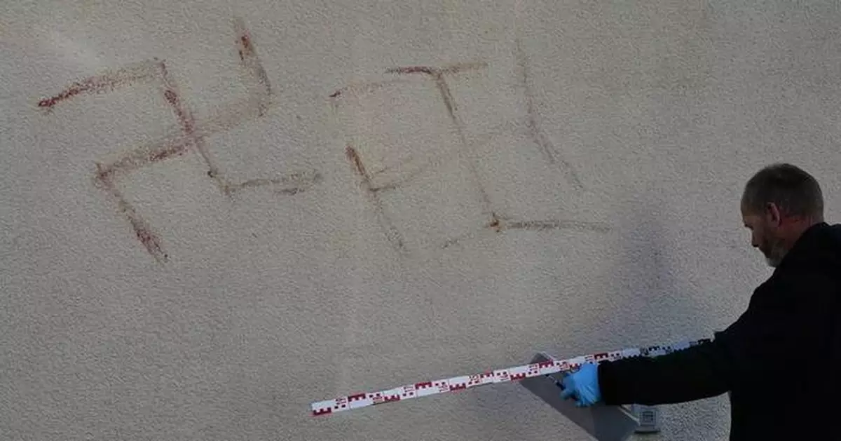 Police detain man who allegedly painted swastikas with his own blood on cars, buildings in Germany