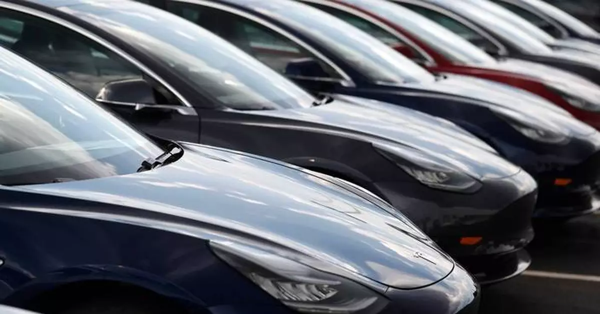 Lawsuit blames Tesla design flaws for crash that killed Washington state woman, injured her husband