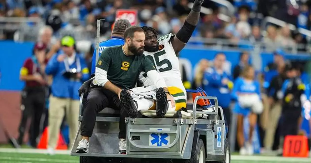 Lions WR Amon-Ra St. Brown and Packers DT Devonte Wyatt leave Thanksgiving game with ankle injuries