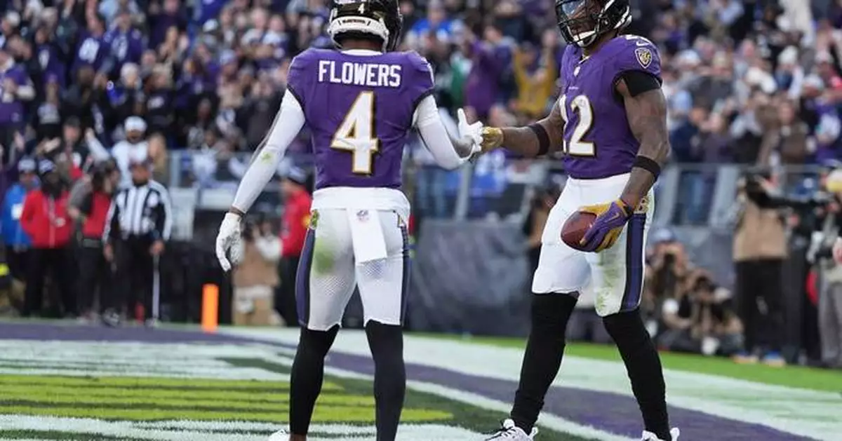 Henry rushes for 2 TDs to help sluggish Ravens to fifth straight win, 23-10 over Jets