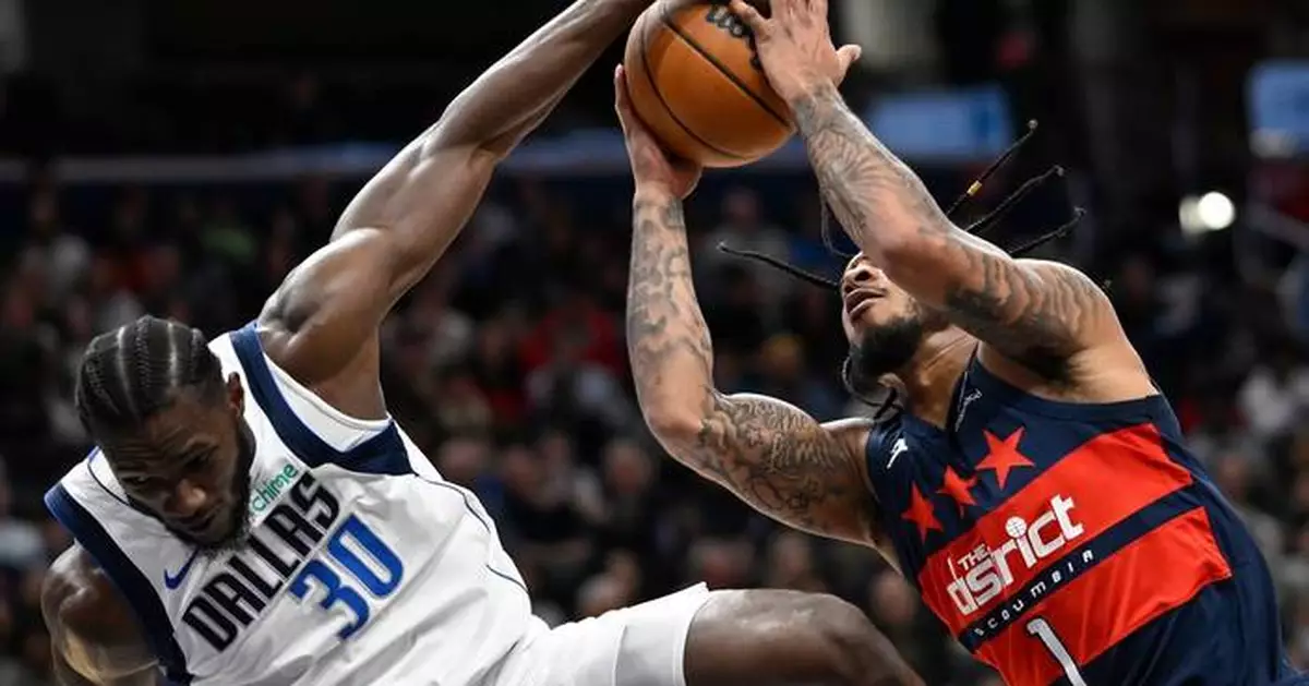 Naji Marshall scores 30 points to lead the Mavericks to 111-105 win over the Wizards