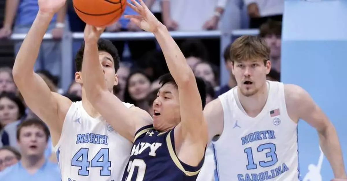 Wilson pushes No. 18 North Carolina past Navy, 73-61