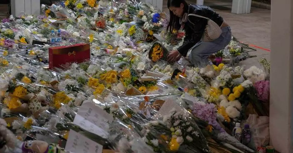 Death toll in Hong Kong apartment complex blaze rises to 146 as the city mourns