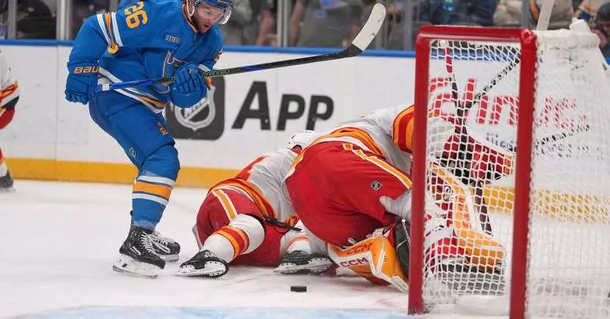 Walker, Binnington lead Blues to 3-2 win over Flames