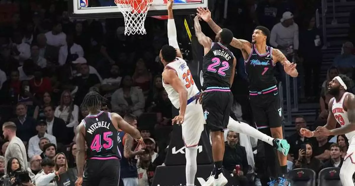 Heat survive frantic rally at the buzzer to edge the Knicks 115-113
