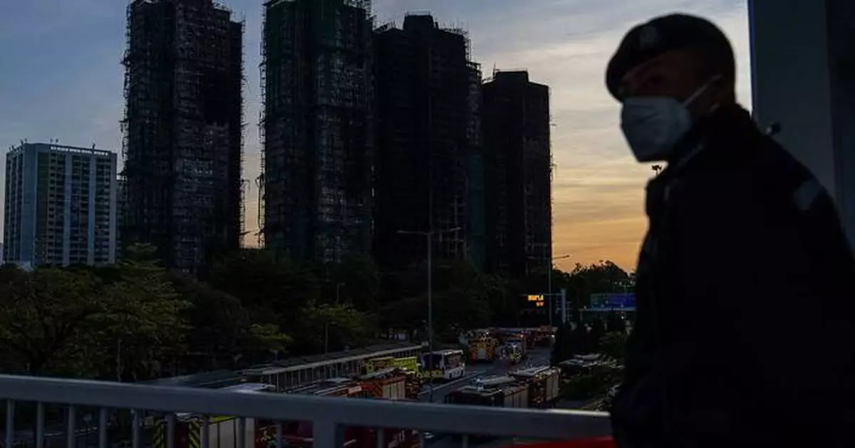 Death toll rises to 128 in Hong Kong residential fire as 8 more arrested over towers' renovation
