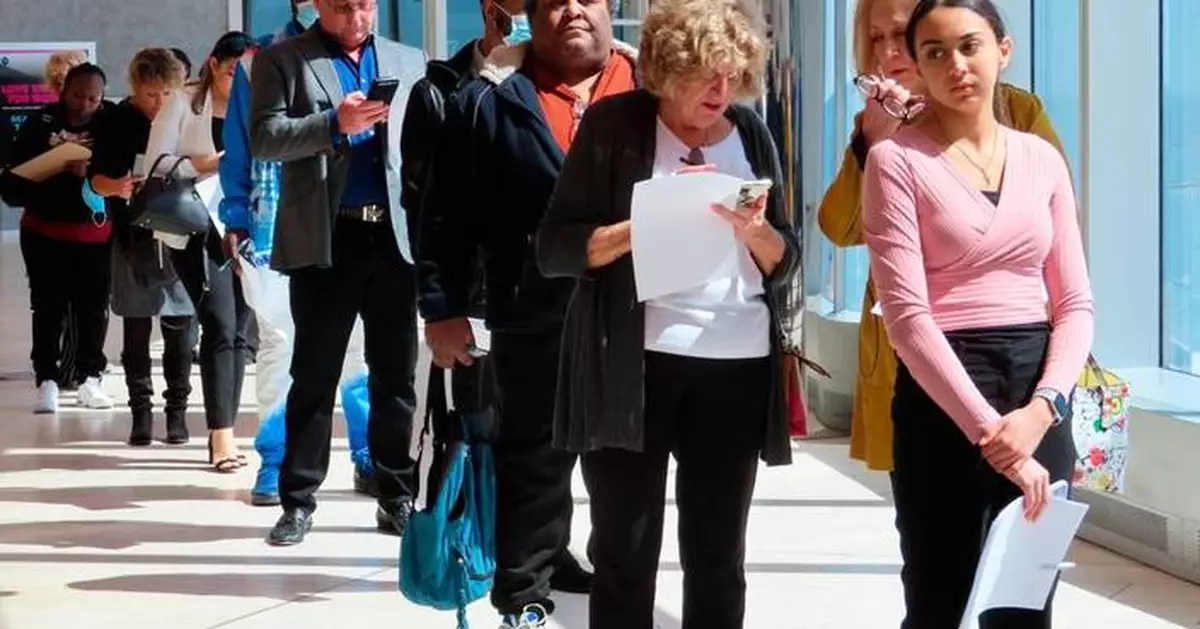 Fewer Americans sought unemployment benefits last week as job cuts stay low