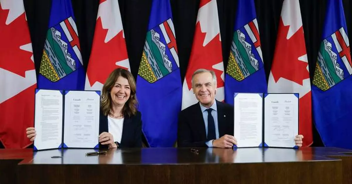 Canada's prime minister and Alberta's premier sign pipeline deal that could reverse oil tanker ban