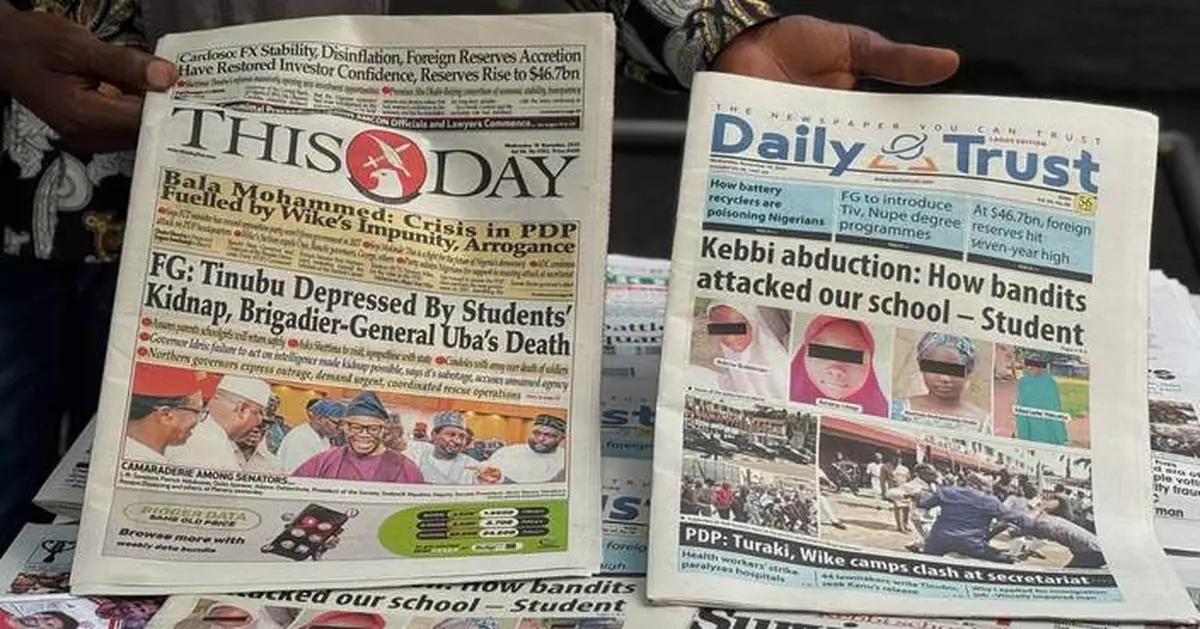 Nigeria's president postpones G20 trip, vowing to step up efforts to rescue abducted schoolgirls