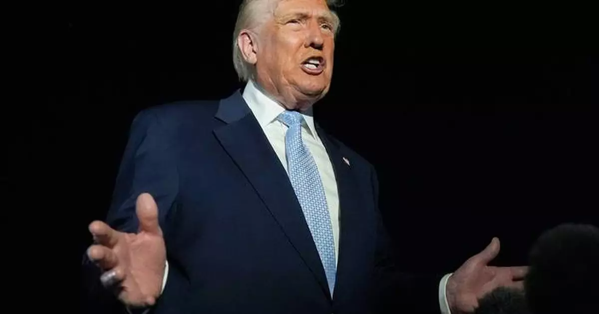 Trump defends Tucker Carlson after interview with activist known for his antisemitic views