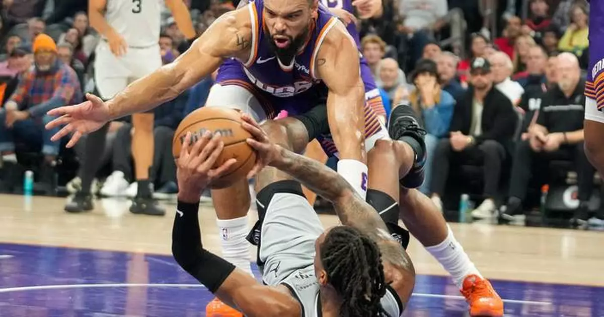 Suns win 3rd straight and end Spurs' 3-game run with 111-102 victory