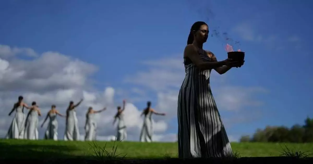 Olympic flame-lighting ceremony in photos