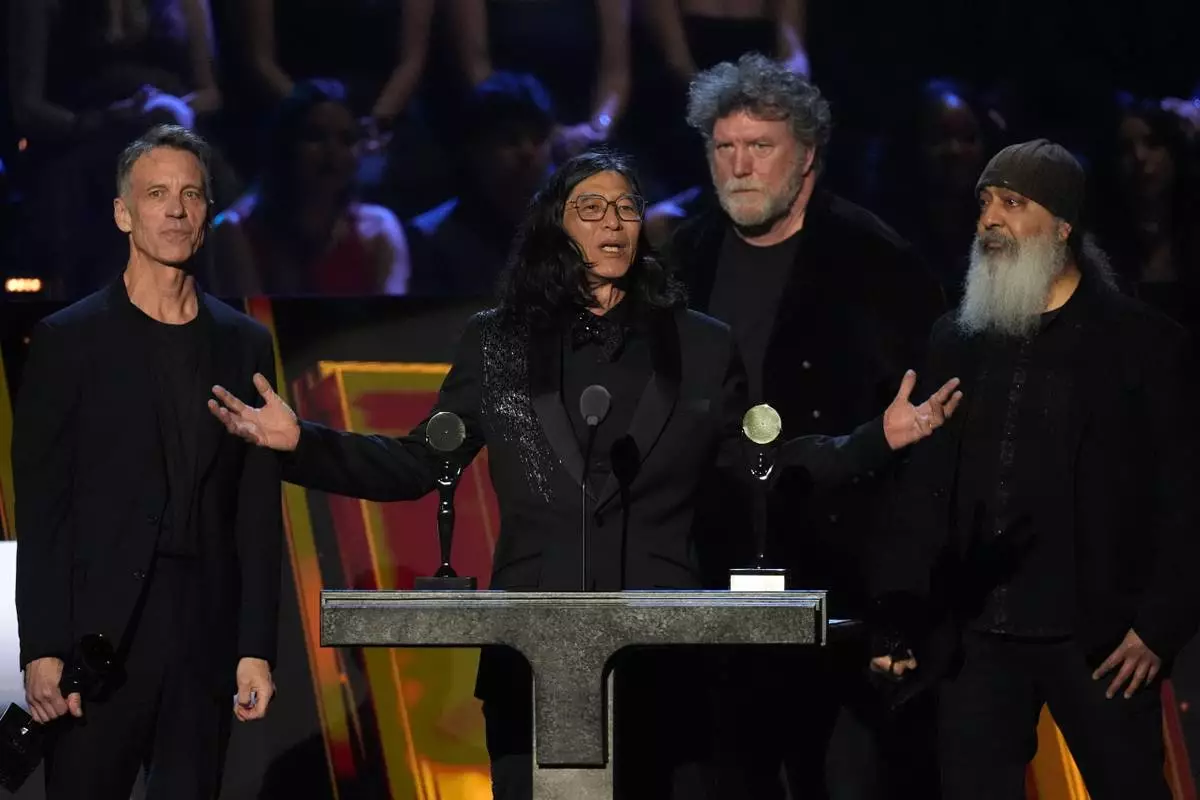 Matt Cameron, from left, Hiro Yamamoto, Ben Shepherd, and Kim Thayil of Soundgarden speak during the 2025 Rock and Roll Hall of Fame Induction Ceremony on Saturday, Nov. 8, 2025, at L.A. Live in Los Angeles. (AP Photo/Chris Pizzello)