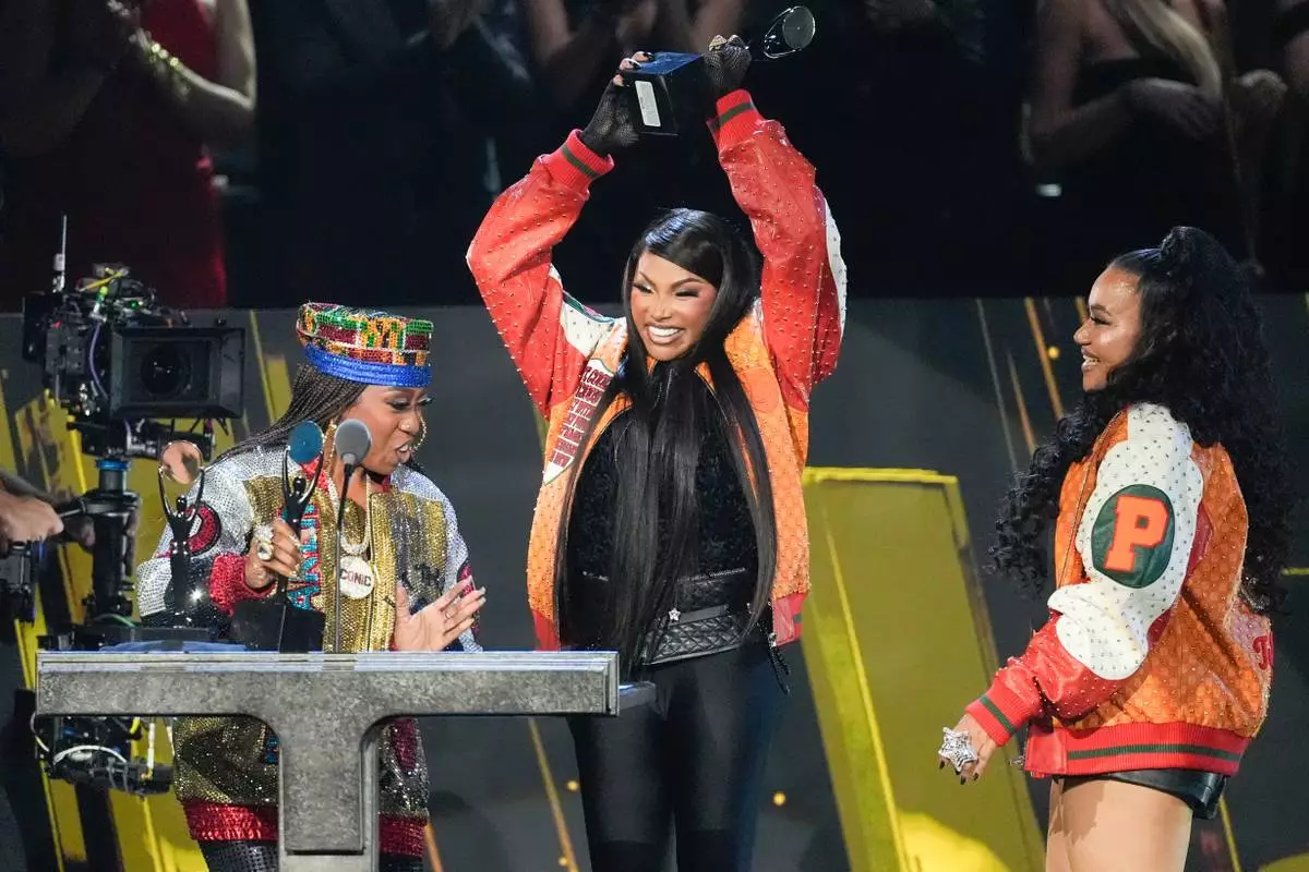Missy Elliott, from left, and Sandra Denton with Cheryl James, right of Salt-N-Pepa, react during the 2025 Rock and Roll Hall of Fame Induction Ceremony on Saturday, Nov. 8, 2025, at L.A. Live in Los Angeles. (AP Photo/Chris Pizzello)
