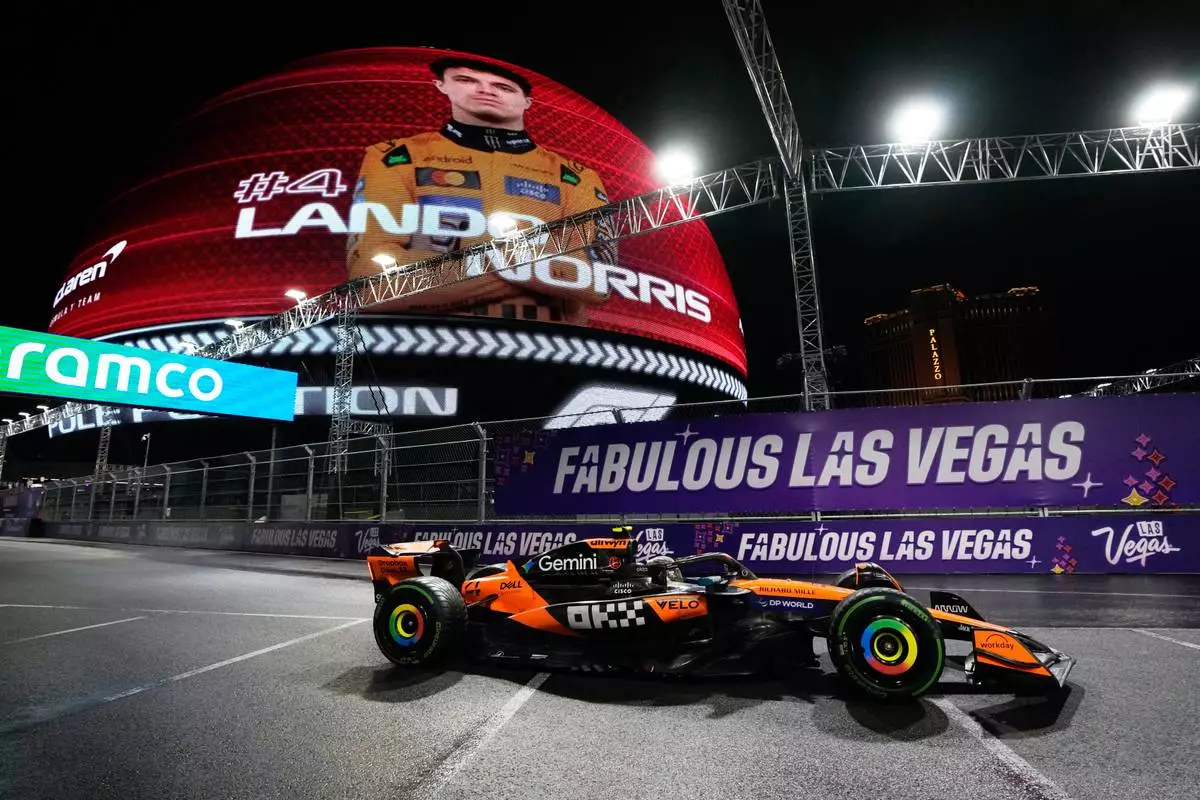 McLaren driver Lando Norris of Great Britain during a qualifying session at the Formula One Las Vegas Grand Prix auto race, Friday, Nov. 21, 2025 in Las Vegas. (AP Photo/John Locher)