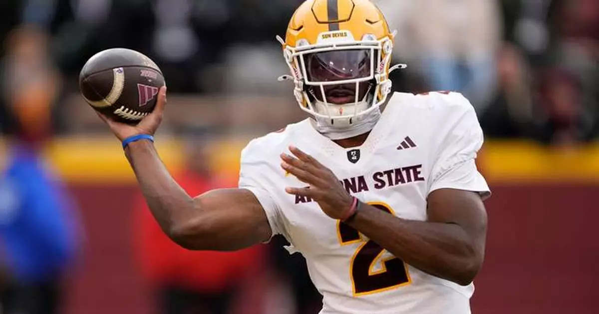 Sims sets Arizona State QB rushing record with 228 yards in 24-19 victory over Iowa State