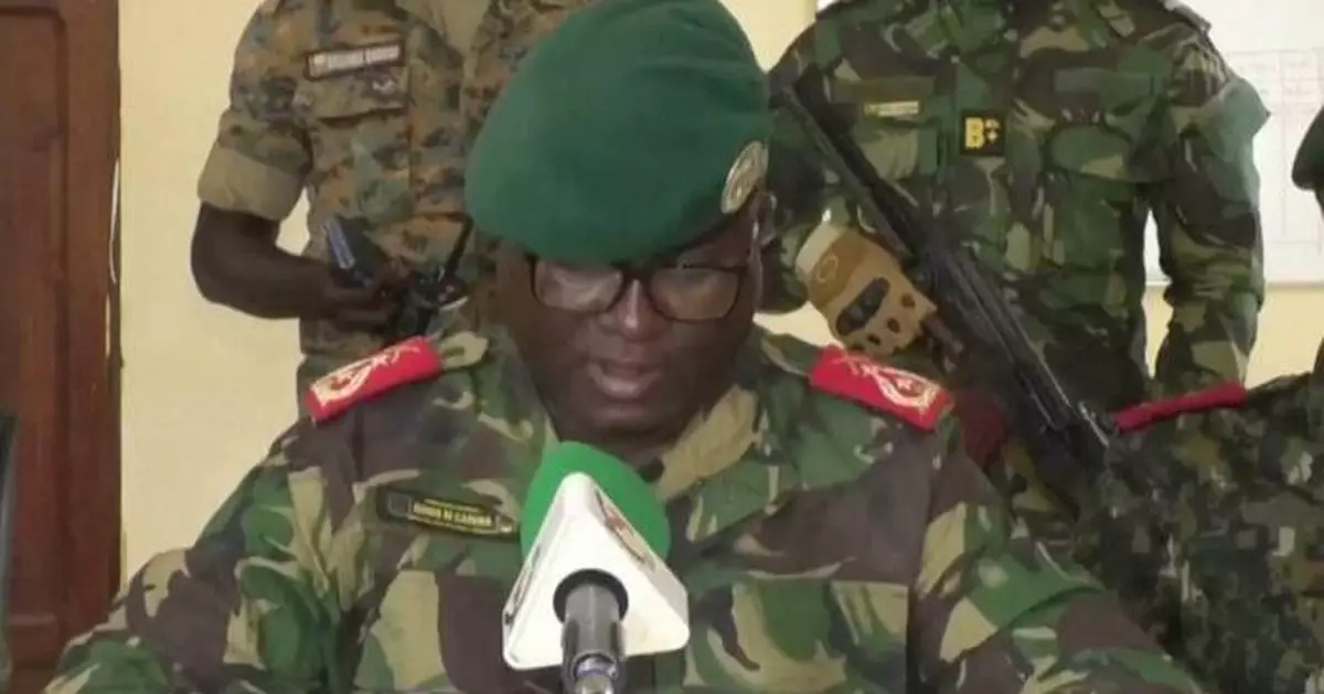 Deposed Guinea-Bissau President Embaló arrives in neighboring Senegal as soldiers name junta leader