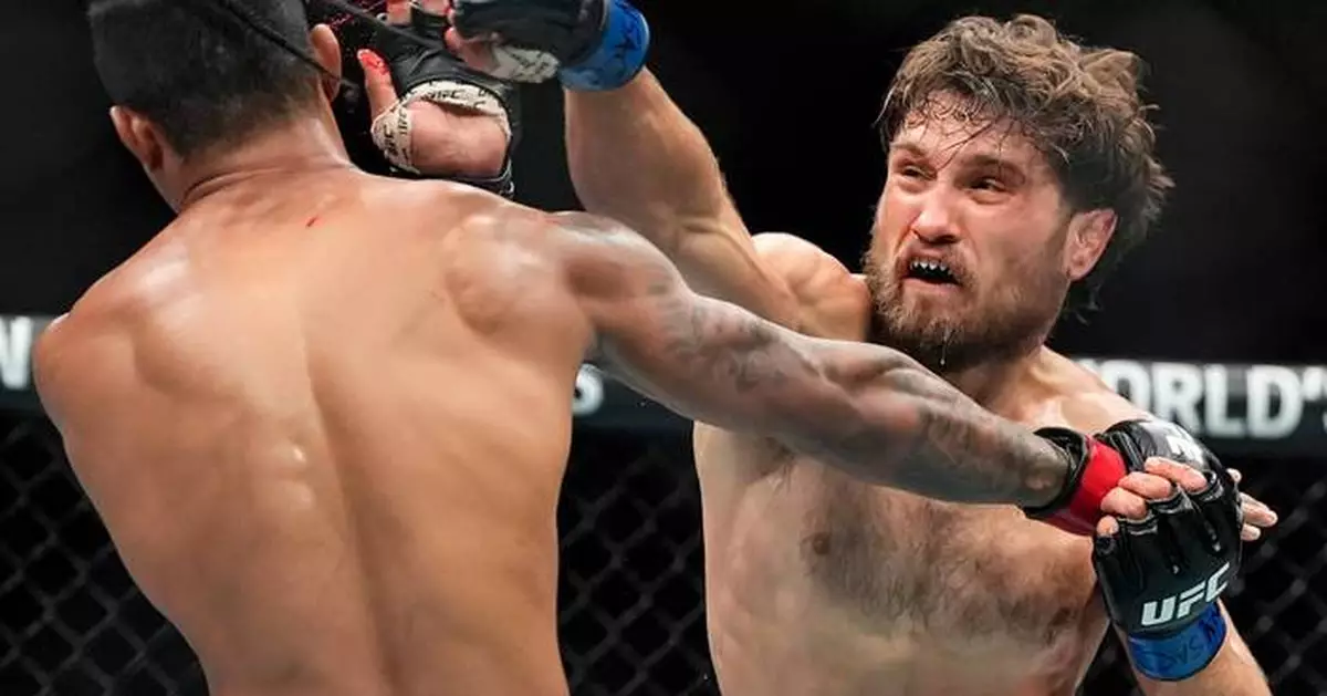 Islam Makhachev wins 170-pound title, ties UFC record with 16th straight victory