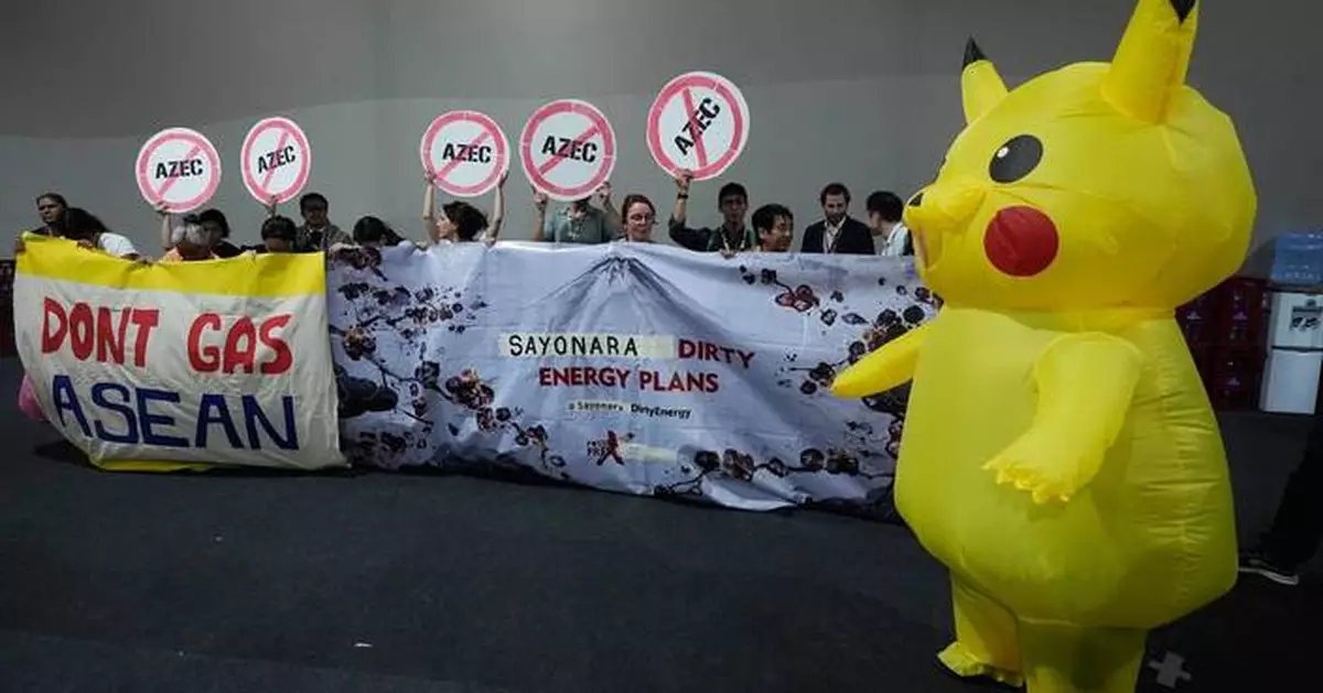 Protesters in Pikachu costumes demand Japan end fossil fuel financing at UN climate conference