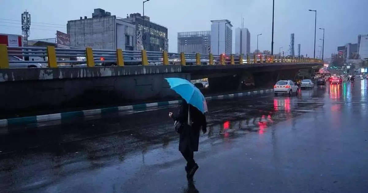 First rain of autumn falls in Iran's capital, but the drought-ravaged nation needs far more