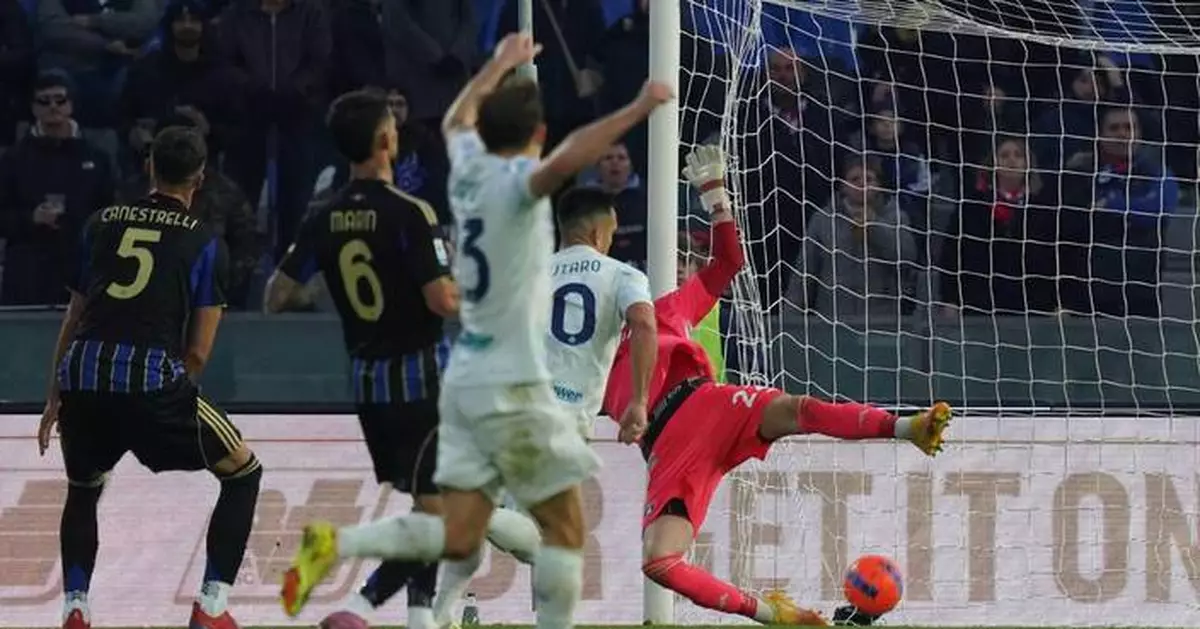 Napoli wins 1-0 at Roma to move level with AC Milan atop tight Serie A standings