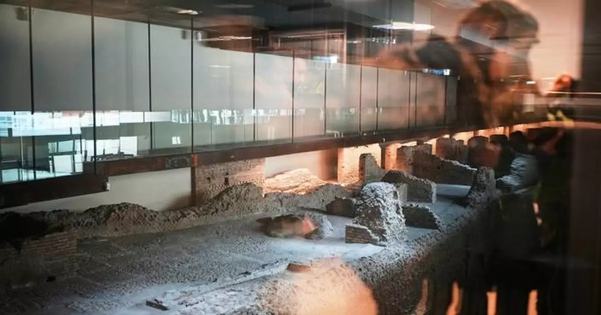 Rome opens long-awaited Colosseum subway station, with displays of unearthed artifacts