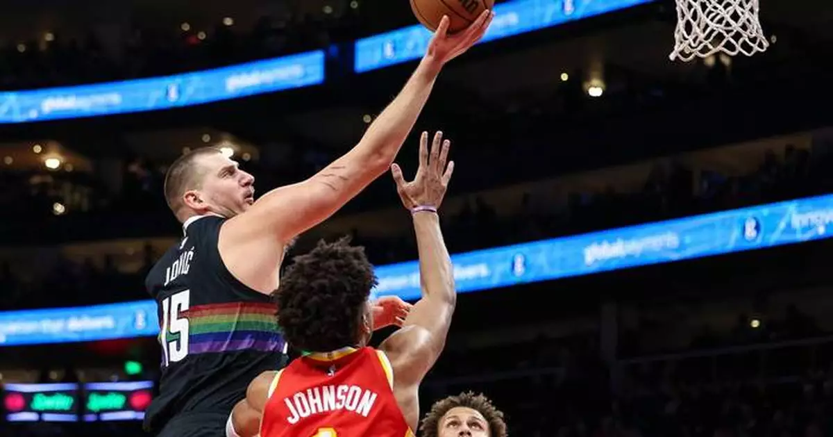 Jokic scores 39 points as Nuggets use big fourth quarter to rally for 134-133 win over Hawks