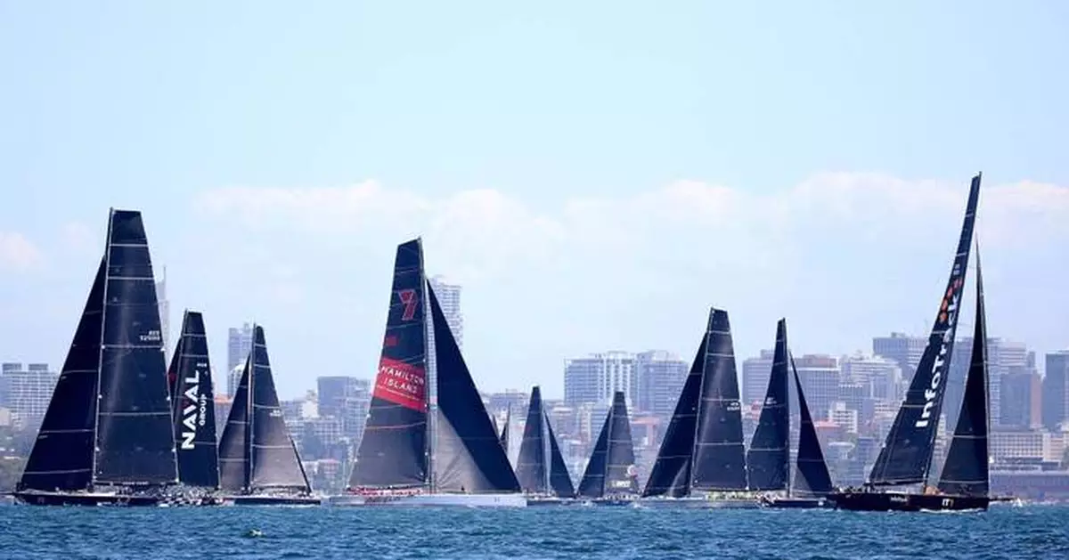 Defending champion LawConnect leads yachts out of Sydney harbor in annual ocean race to Hobart
