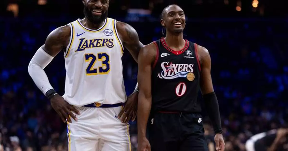 James hits go-ahead 3 and scores 29 points, Doncic has triple-double in Lakers' win over 76ers