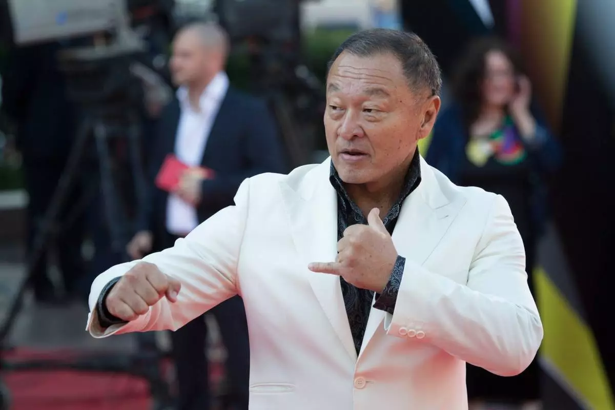 FILE - Actor Cary-Hiroyuki Tagawa pose on the red carpet at the opening ceremony of the 35th Moscow International Film Festival in Moscow, Russia, June 20, 2013. (AP Photo/Alexander Zemlianichenko Jr, File)