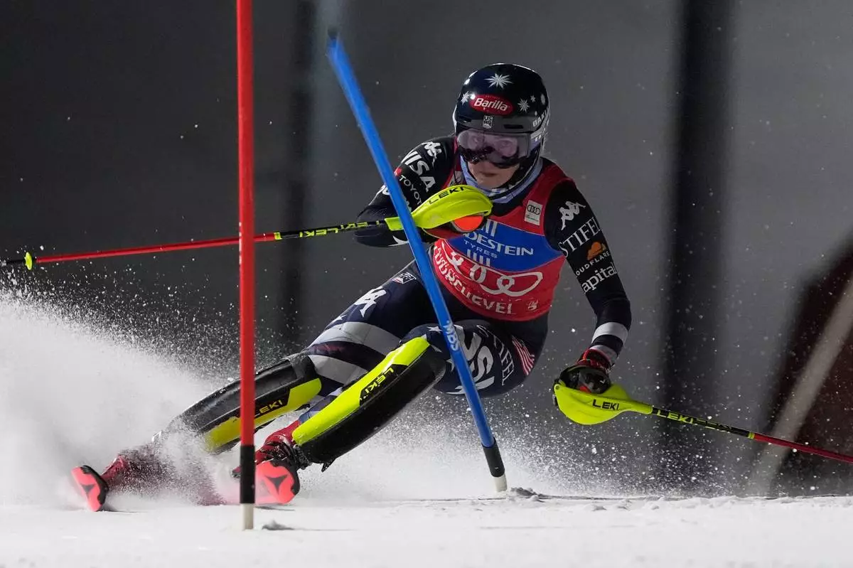 United States' Mikaela Shiffrin competes in an alpine ski, women's World Cup slalom, in Courchevel, France, Tuesday, Dec. 16, 2025. (AP Photo/Giovanni Auletta)