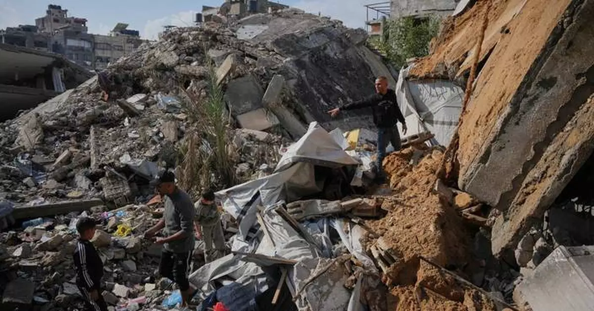 Gaza families struggle to recover from days of torrential rains that killed 12 people