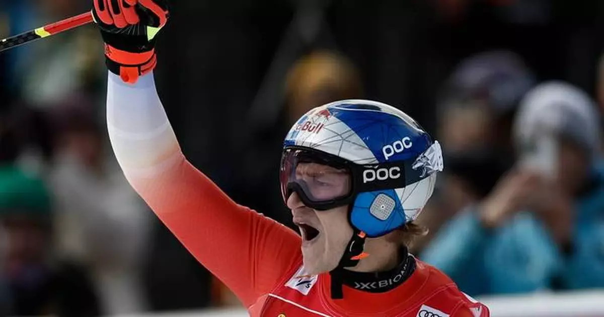 Swiss ski star Odermatt wins foggy downhill to match Tomba's 50 in World Cup races