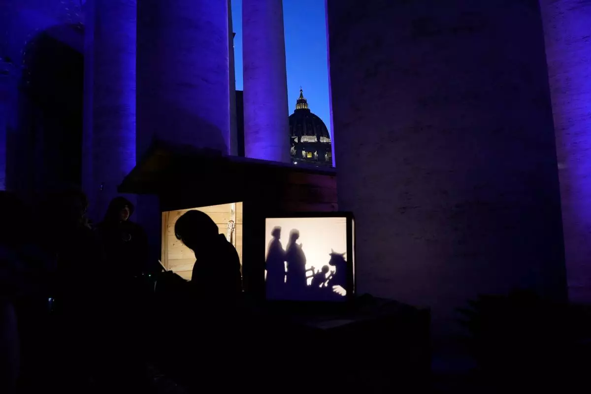 FILE - A Christmas crib scene is displayed at the International Exhibition "100 Nativity Scenes in the Vatican," which opens in St. Peter's Square on Monday, Dec. 8, 2025. (AP Photo/Gregorio Borgia, File)